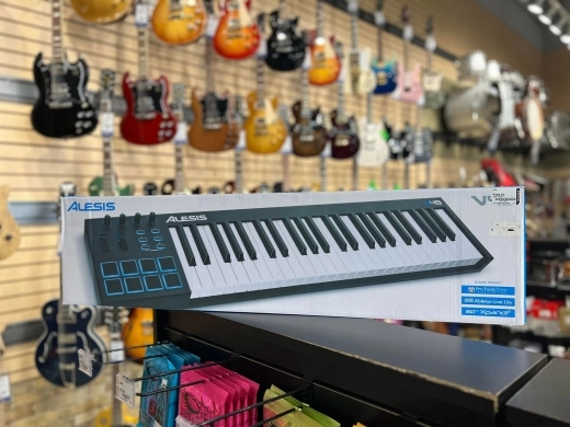 ALESIS - 49 KEY/VEL SENS/8 PAD KYBD CONTRLR