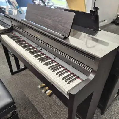 Roland - Piano num�rique HP704 avec support et banc - Palissandre fonc� 2