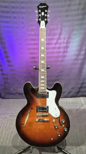 Epiphone - Guitare �lectrique Riviera mod�le Bonehead (fini Sunburst tabac fonc�, �tui rigide inclus)