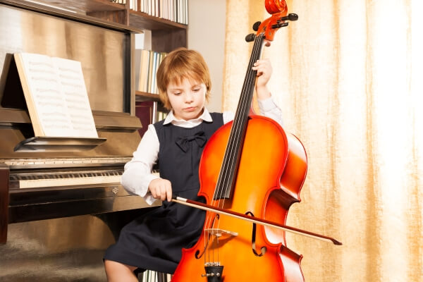 A child playing the Cello