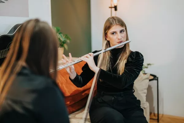 adult woman learning the Flute