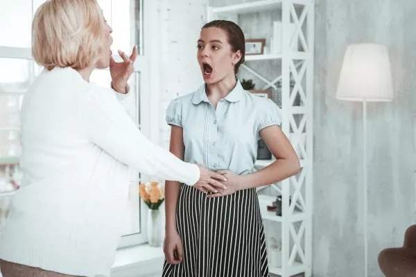 Teenager taking vocal lessons with a teacher