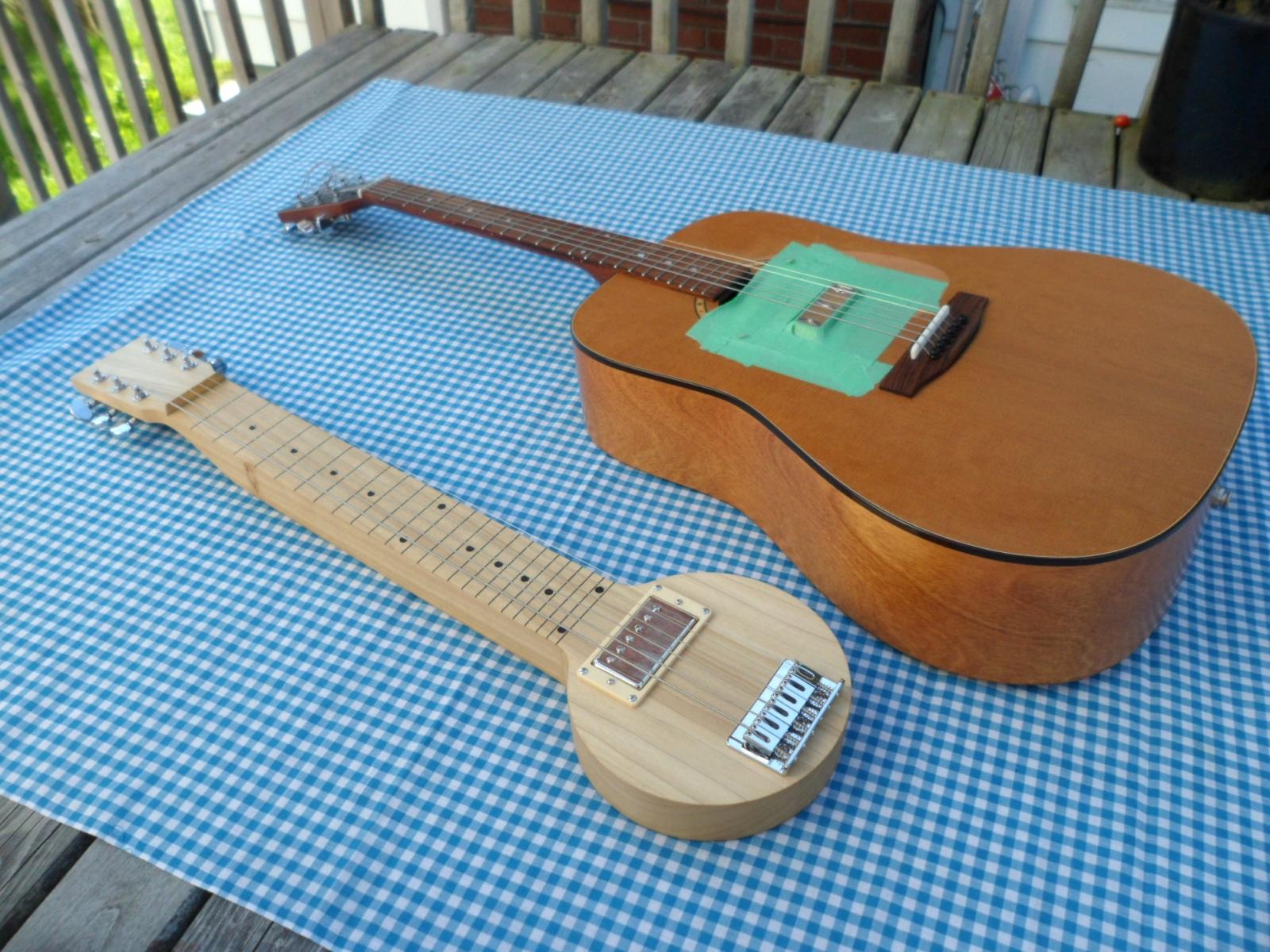 Tremblay Guitars lap steel (left) and a Simon & Patrick converted lap slide (right).
